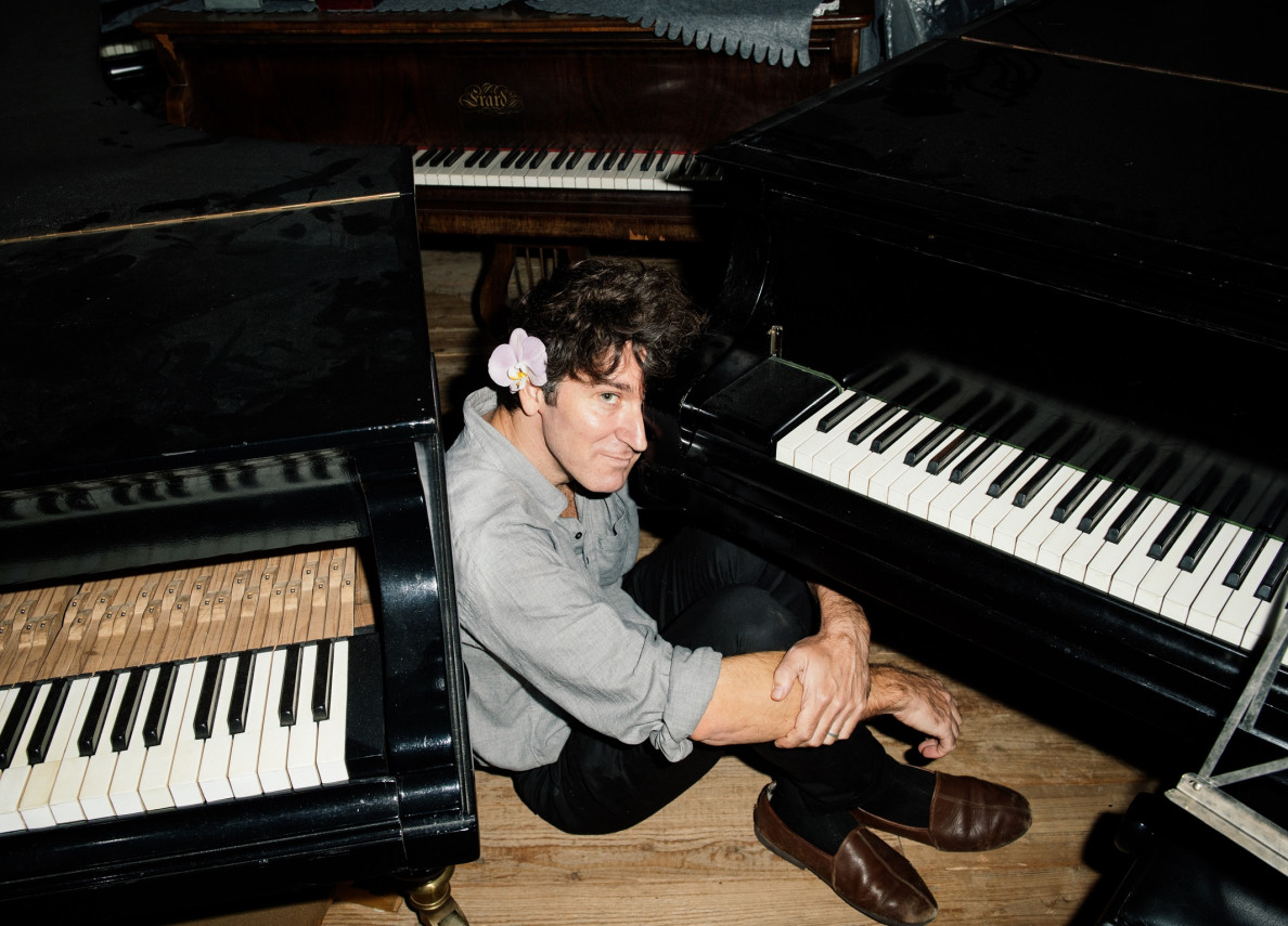 Marcin Masecki with a piano
